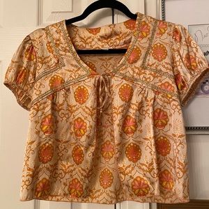 Orange patterned silk blouse